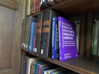 my books on the shelves of Gladstone's library
